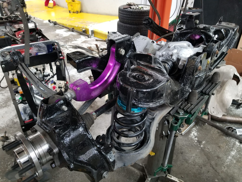 Cleaned-up parts to go back on the rear of the car. Photo via Johnny Youssef/C30 Crew; used with permission.